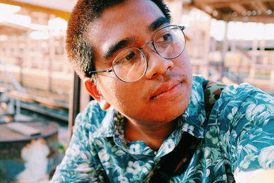 Portrait of young man with eyeglasses