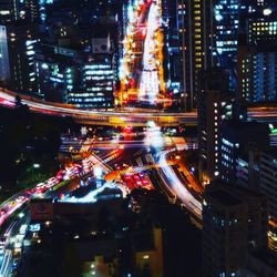 High angle view of illuminated city at night