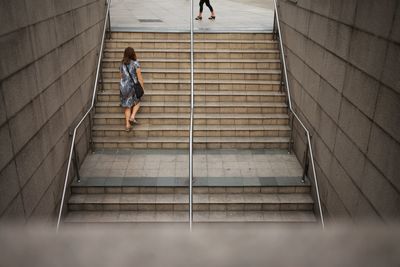 Low angle view of man on staircase