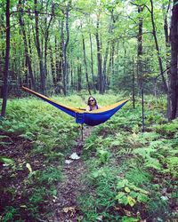 Man sitting in forest