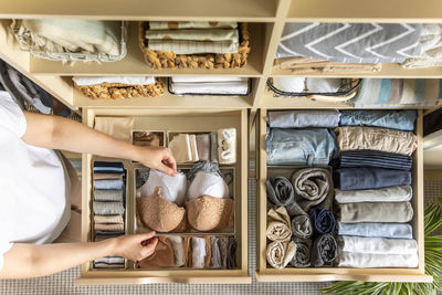 Midsection of woman standing in store