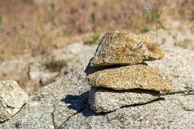 Close-up of stone stack on rock