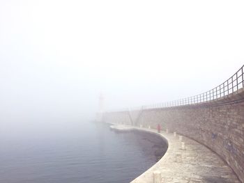 View of built structure in foggy weather