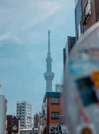 Buildings in city against sky