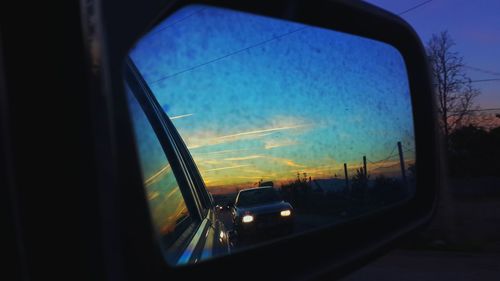 View of road seen through train window