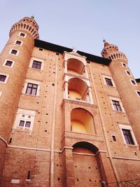 Low angle view of historic building against clear sky