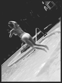 Blurred motion of woman in water