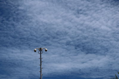 Low angle view of street light against sky