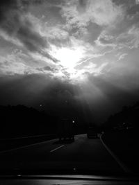 View of road against cloudy sky