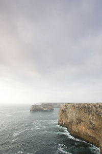 Scenic view of sea and cliff