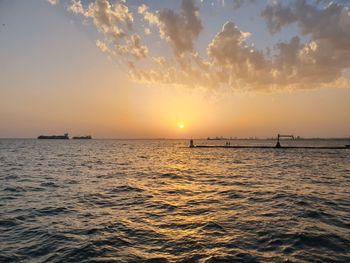 Scenic view of sea against sky during sunset