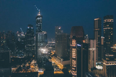 Illuminated cityscape at night