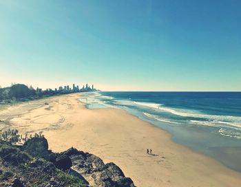 Scenic view of beach against clear sky