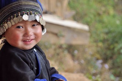 Portrait of cute baby boy wearing traditional clothing