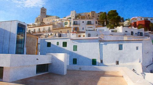 Buildings in city against blue sky