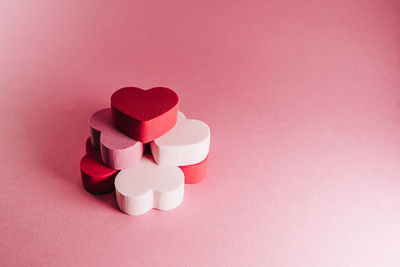 Close-up of heart shape on pink background