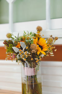 Close-up of flower vase on table