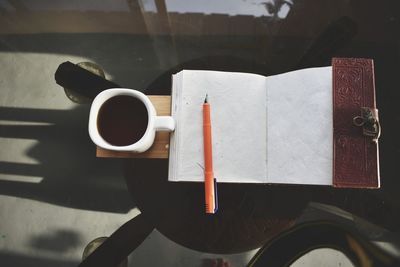 High angle view of coffee cup on table