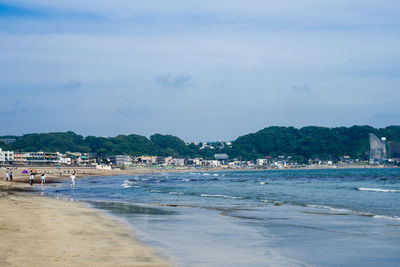 Scenic view of beach against sky