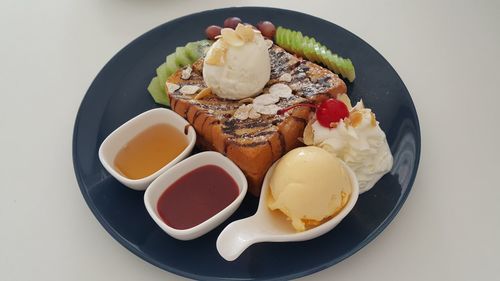 Close-up of breakfast served on table