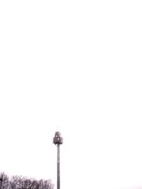 Low angle view of floodlight against clear sky