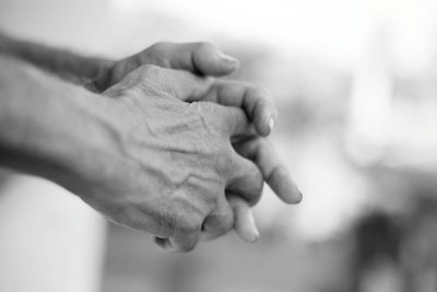 Close-up of woman holding hands