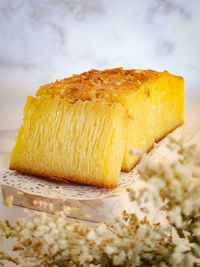 Close up yellow cake or bika ambon with marmer background