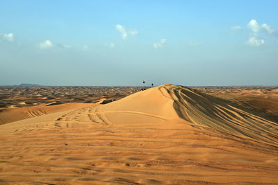 Scenic view of desert against sky