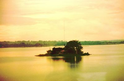 Scenic view of lake at sunset