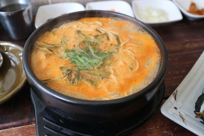 Soup in bowl on table