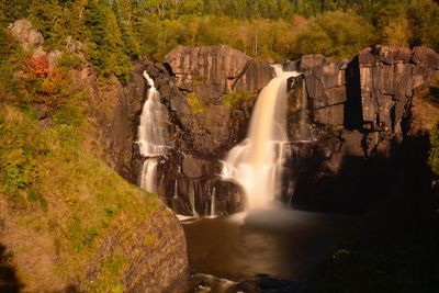 View of waterfall in forest