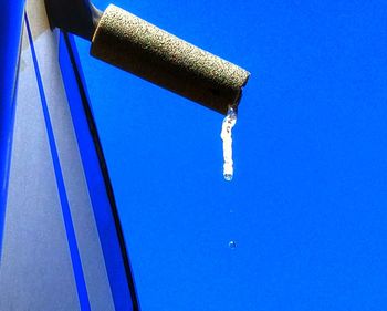 Close-up low angle view of blue sky