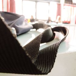 Close-up of shoes on table at home