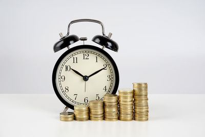 Clock tower against white background