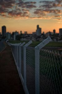 View of city against sky during sunset