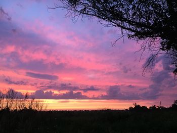 Scenic view of silhouette landscape against sky during sunset