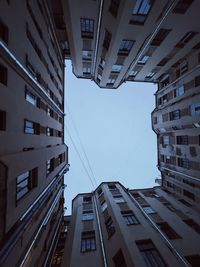 Low angle view of buildings against clear sky