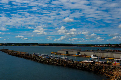 Pier over sea against sky