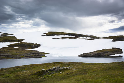 Scenic view of land against sky