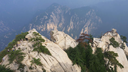 Panoramic view of rocks and mountains against sky