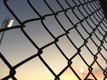 Full frame shot of chainlink fence against clear sky