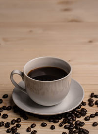 Close-up of coffee cup on table