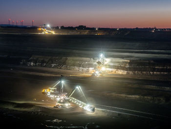 High angle view of illuminated city at night