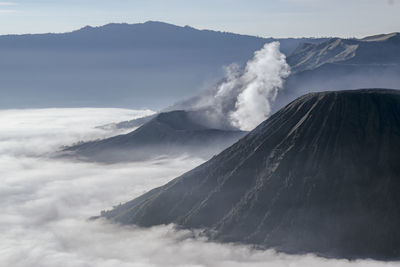 Scenic view of volcanic mountain against sky