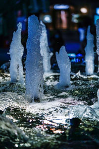 Close-up of frozen water in city
