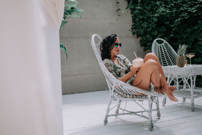 Woman sitting on chair