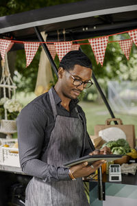 Man at food stall