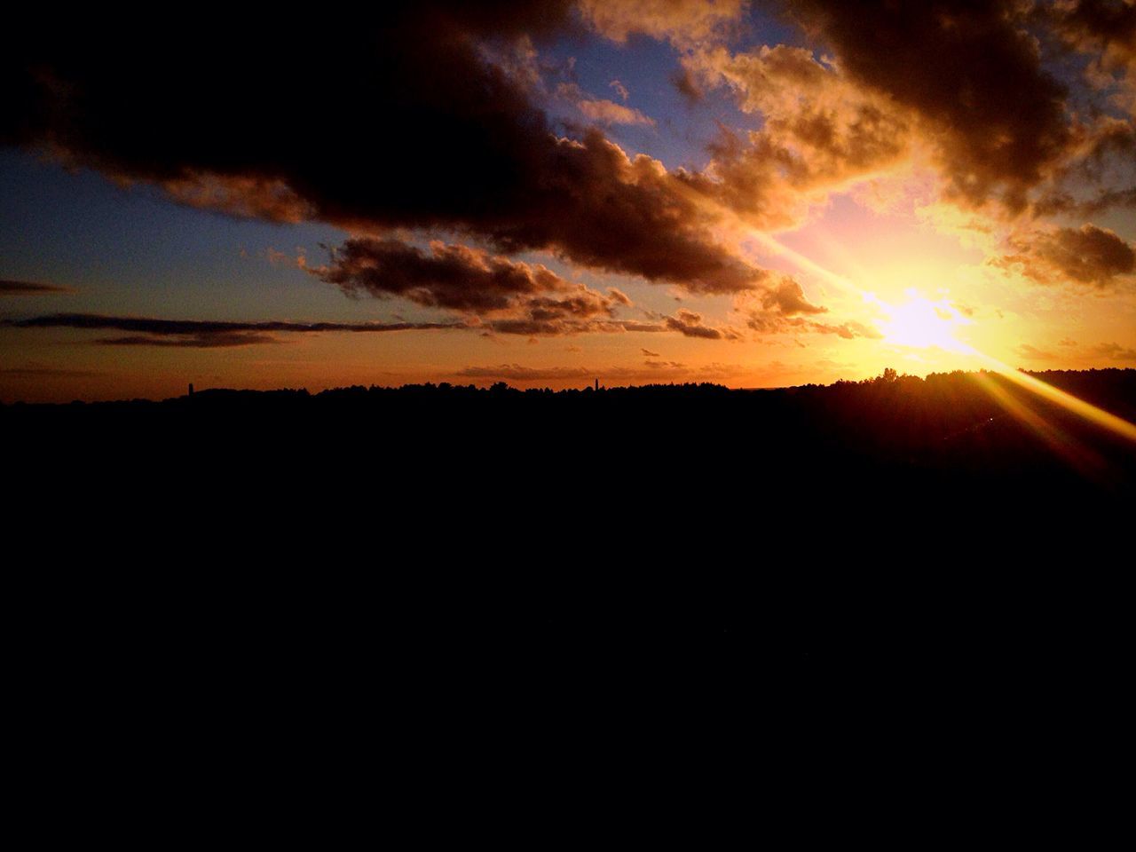 SILHOUETTE LANDSCAPE AT SUNSET