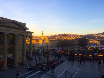 View of city street during sunset