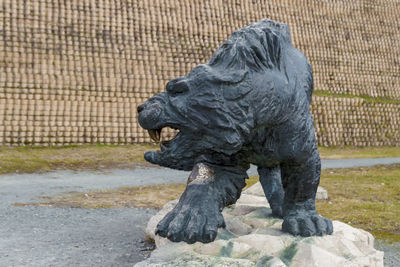 Statue of lion in zoo